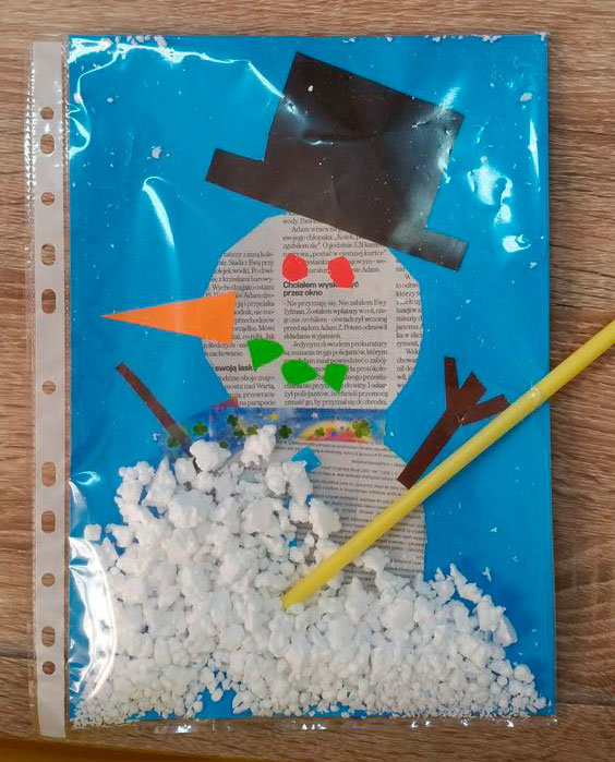 как делать снеговика из бумаги из кружочков 7